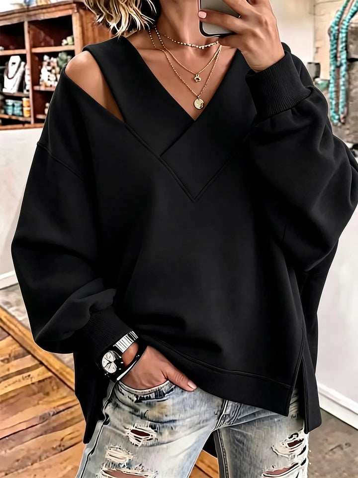 Kirstan - Κομψό φούτερ με V-neck και cutout, σε oversized γραμμή