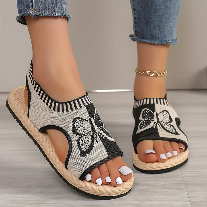 khulood - Άνετα σανδάλια με επίπεδη σόλα και μοτίβο πεταλούδας