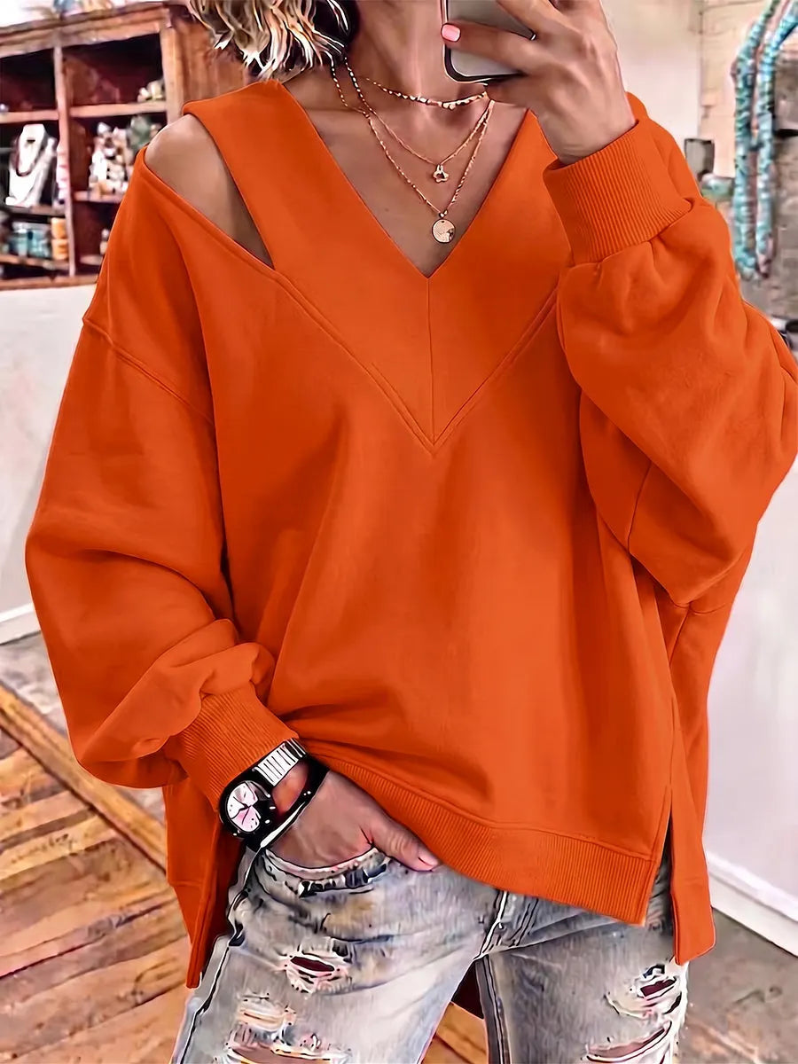 Kirstan - Κομψό φούτερ με V-neck και cutout, σε oversized γραμμή