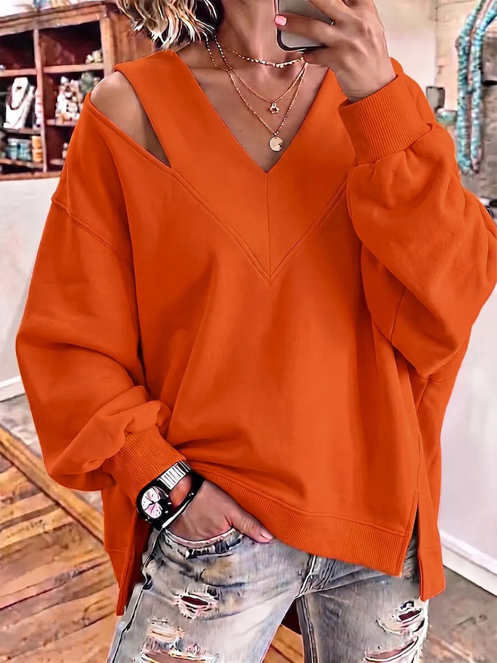Kirstan - Κομψό φούτερ με V-neck και cutout, σε oversized γραμμή