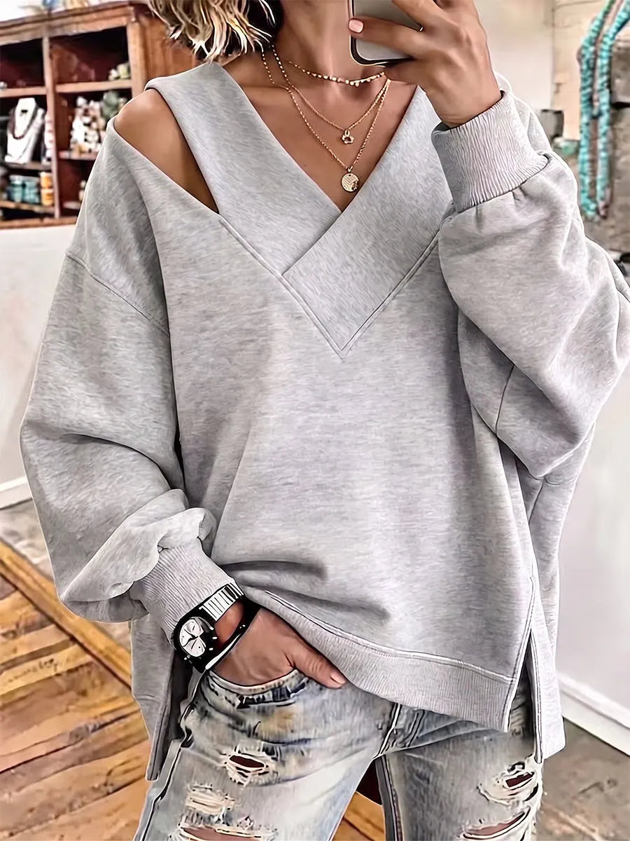Kirstan - Κομψό φούτερ με V-neck και cutout, σε oversized γραμμή