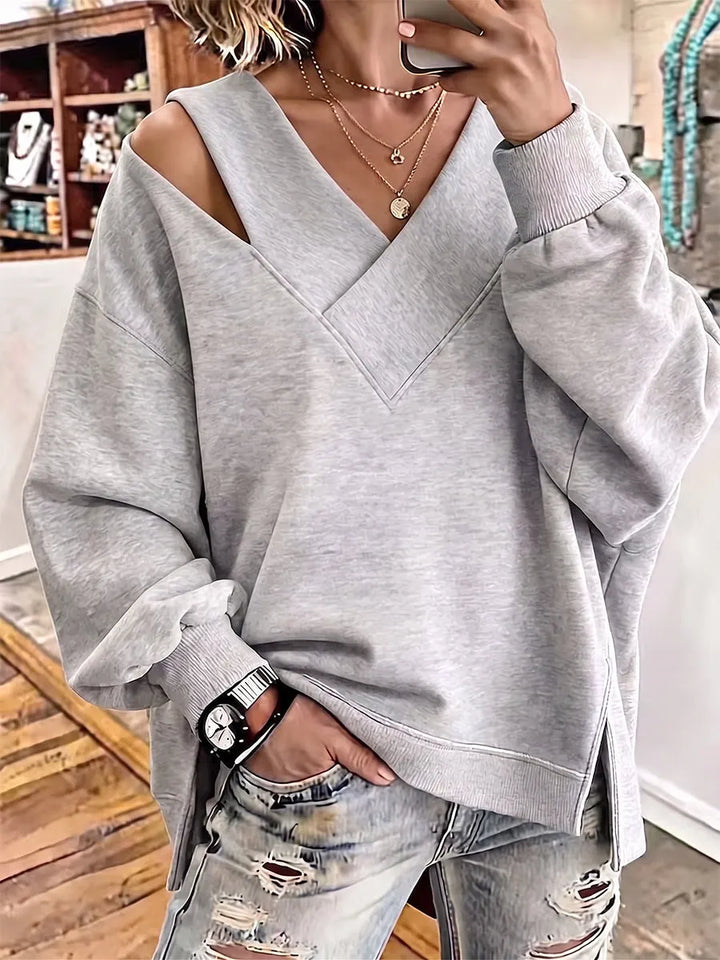 Kirstan - Κομψό φούτερ με V-neck και cutout, σε oversized γραμμή