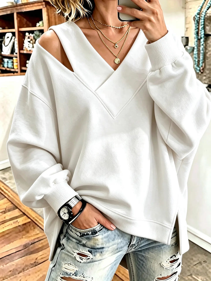 Kirstan - Κομψό φούτερ με V-neck και cutout, σε oversized γραμμή