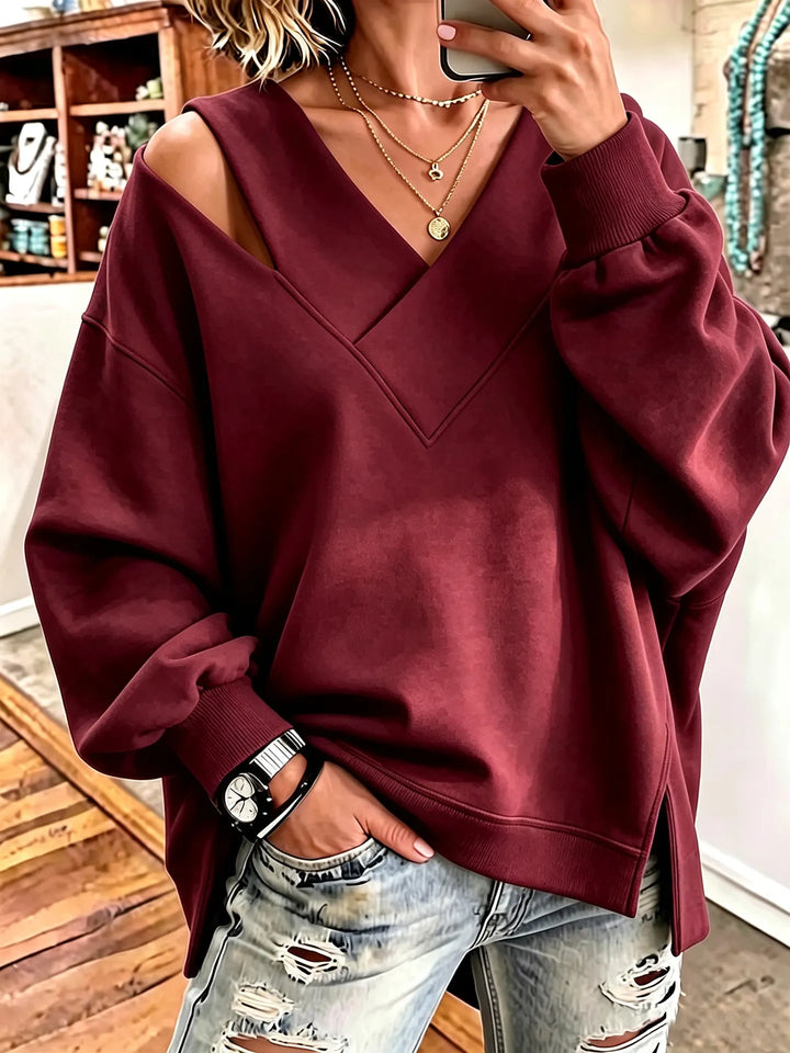 Kirstan - Κομψό φούτερ με V-neck και cutout, σε oversized γραμμή