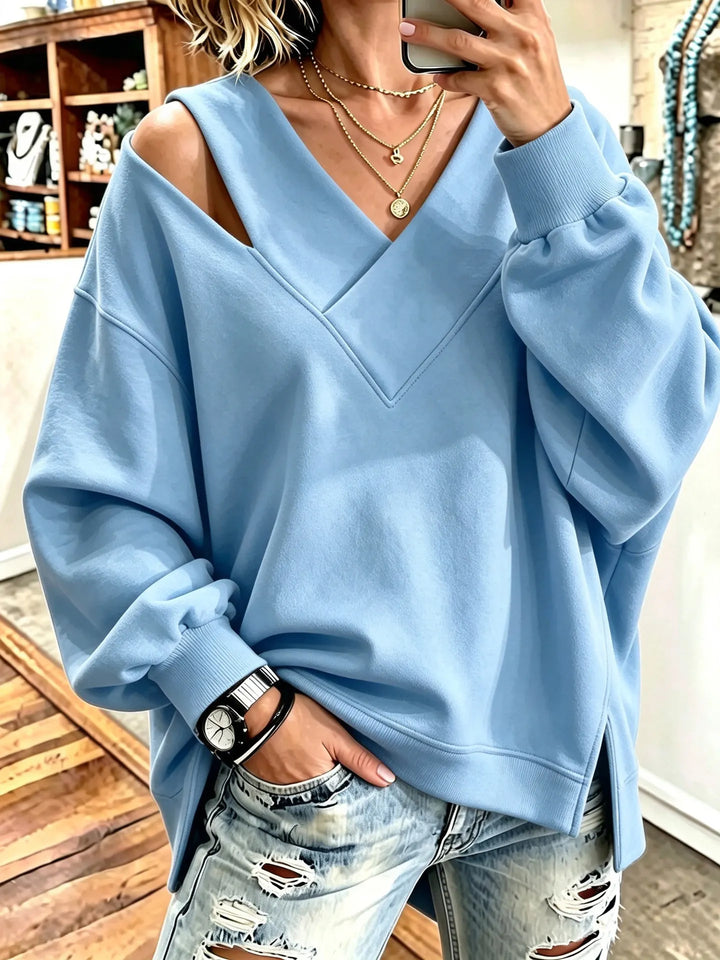 Kirstan - Κομψό φούτερ με V-neck και cutout, σε oversized γραμμή