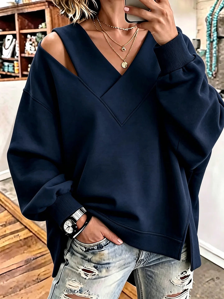 Kirstan - Κομψό φούτερ με V-neck και cutout, σε oversized γραμμή